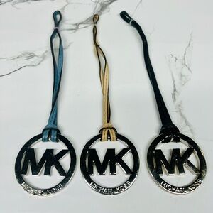 Bundle of Michael Kors Blue, Tan, and Black Logo Keychains